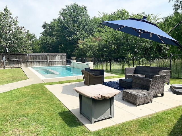 view of swimming pool with a fenced backyard, a yard, a patio, and a fenced in pool