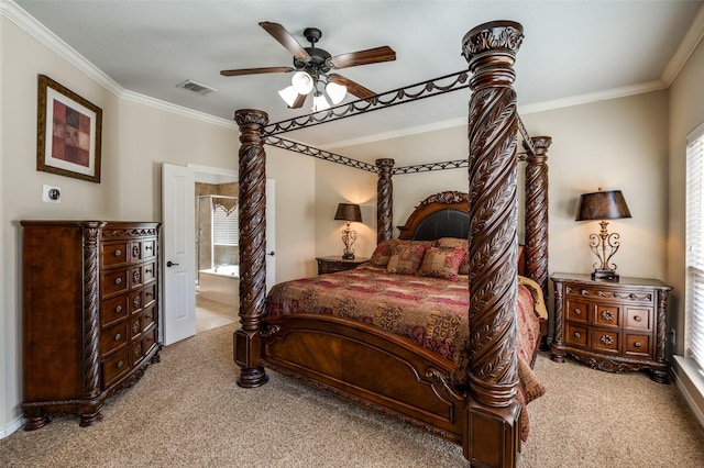 bedroom featuring visible vents, ensuite bath, carpet flooring, crown molding, and ceiling fan