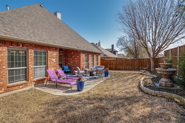 view of yard with a patio area and fence