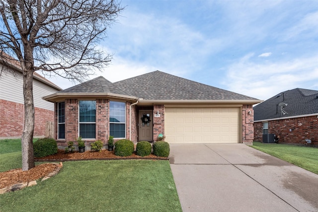 ranch-style house with driveway, an attached garage, a shingled roof, a front lawn, and brick siding