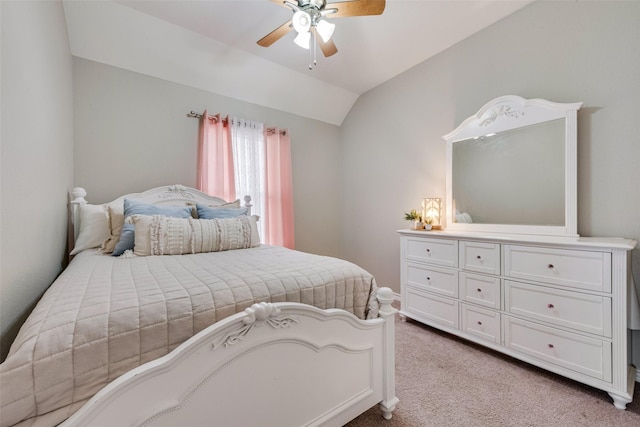 bedroom featuring light carpet, ceiling fan, and lofted ceiling