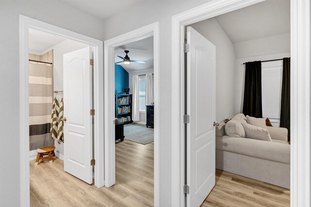 hallway with light wood finished floors