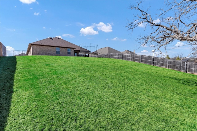 view of yard featuring a fenced backyard