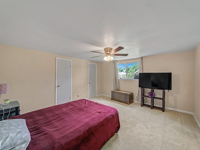 6930 Trailcrest Dr, Dallas, TX 75232 - carpeted bedroom with baseboards and a ceiling fan