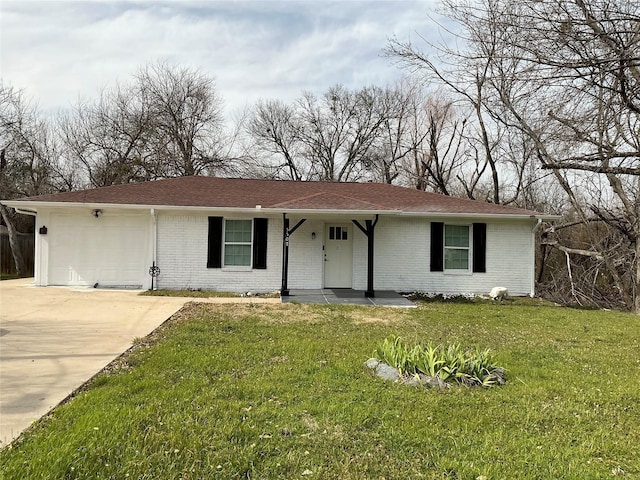 ranch-style home with driveway, an attached garage, covered porch, a front lawn, and brick siding