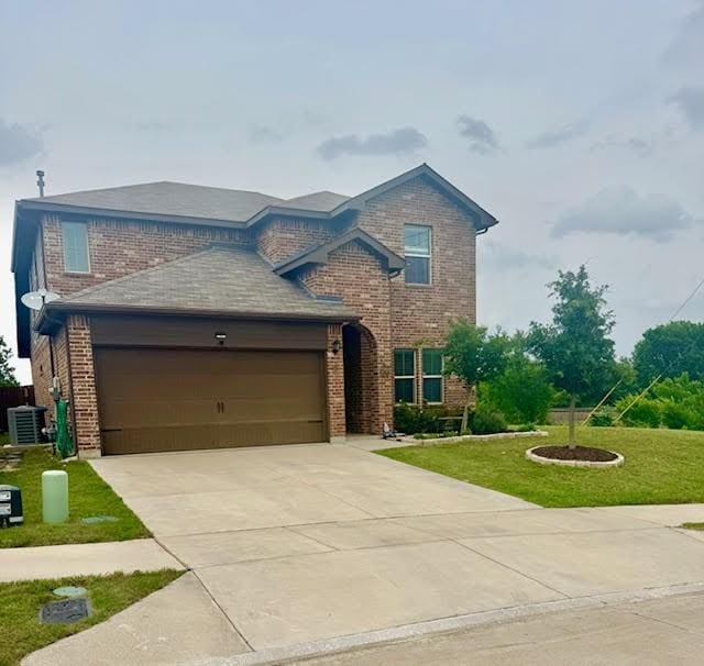 100 Green Water Dr, Fort Worth, TX 76131 - traditional-style home with brick siding, a front yard, a garage, central AC, and concrete driveway