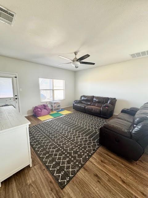 100 Green Water Dr, Fort Worth, TX 76131 - living room with wood finished floors and a ceiling fan