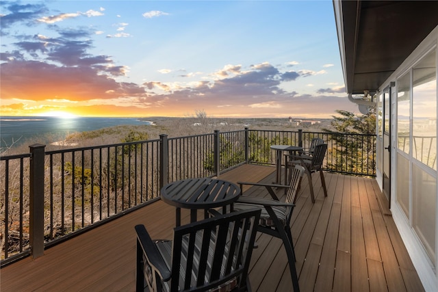 deck featuring a water view