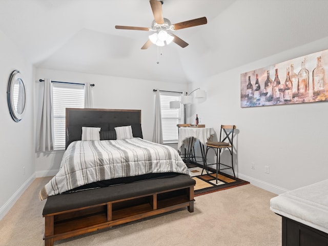 bedroom featuring carpet flooring, multiple windows, baseboards, and lofted ceiling