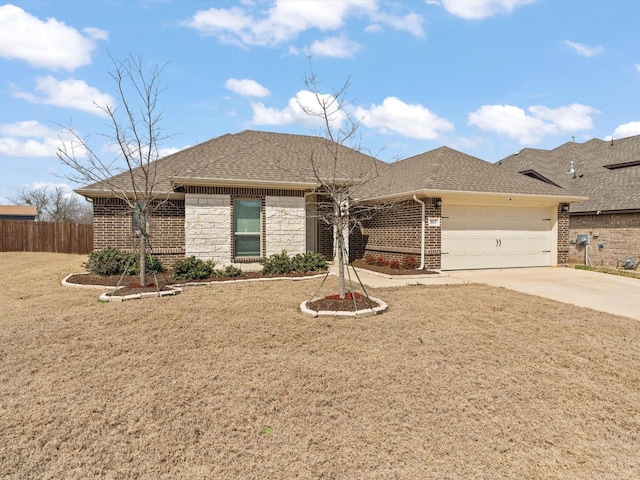 view of front facade with a garage, brick siding, roof with shingles, and driveway