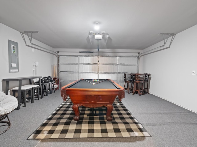 playroom with electric panel, a garage, and billiards