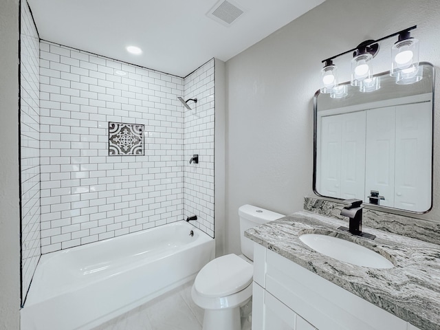 full bathroom featuring visible vents, vanity, toilet, and bathing tub / shower combination