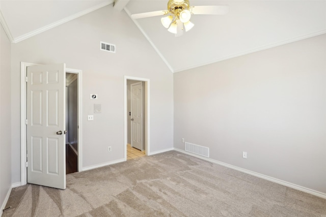 unfurnished bedroom with light carpet, visible vents, baseboards, and ornamental molding