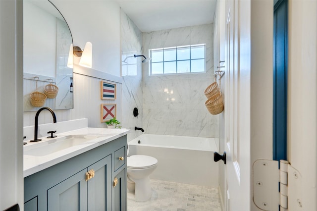 bathroom featuring vanity, toilet, and bathing tub / shower combination