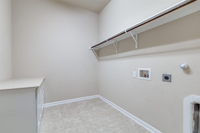 laundry room with laundry area, hookup for a washing machine, hookup for an electric dryer, and baseboards