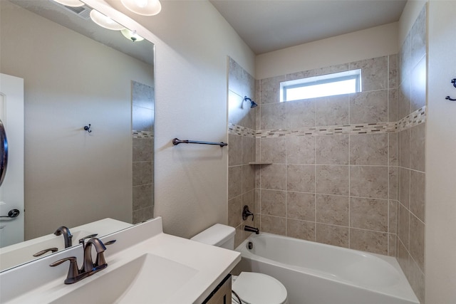 full bath with shower / bath combination, toilet, visible vents, and vanity