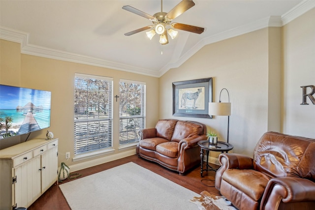 living room with lofted ceiling, wood finished floors, and crown molding