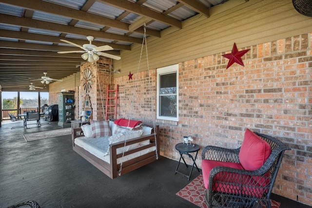 view of patio / terrace with outdoor dining space, an outdoor living space, and ceiling fan