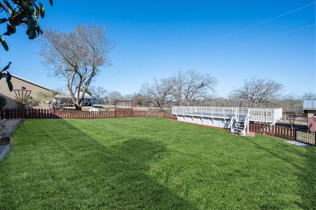 view of yard with a fenced backyard and a fenced in pool