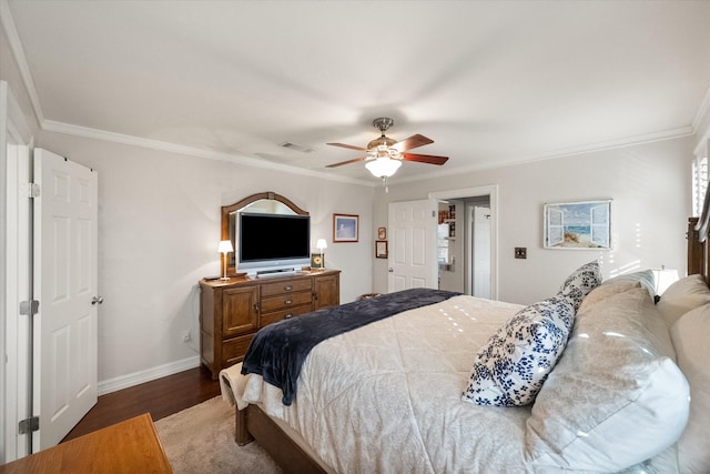 bedroom featuring visible vents, baseboards, light wood-type flooring, and ornamental molding