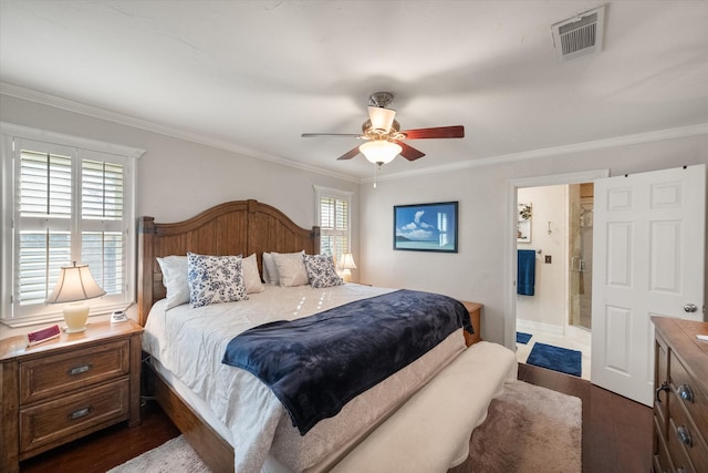 bedroom with ceiling fan, crown molding, visible vents, and dark wood-type flooring