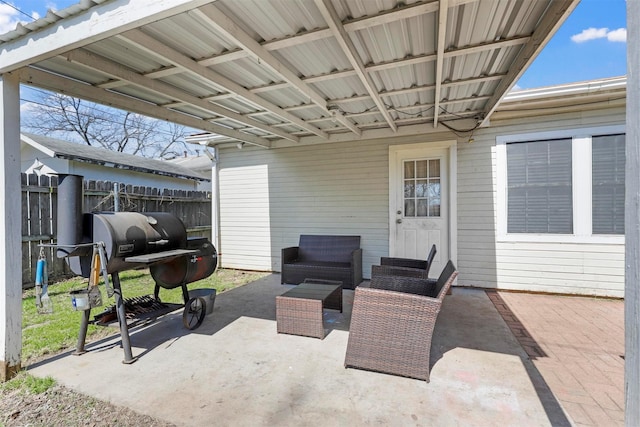 view of patio featuring fence