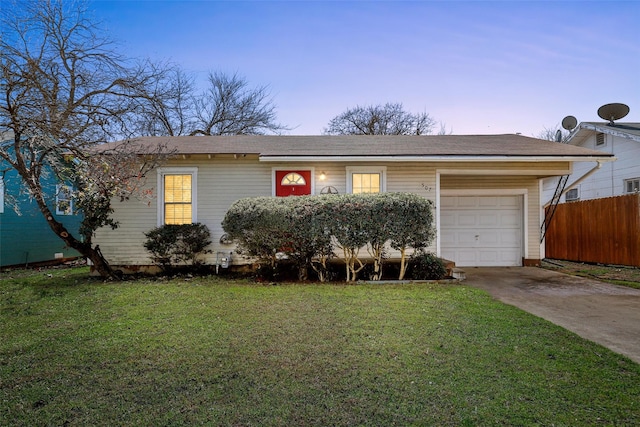 single story home with concrete driveway, a yard, fence, and a garage