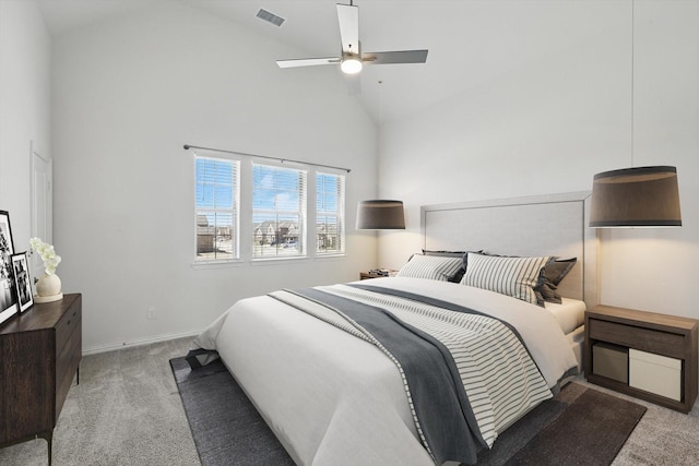 bedroom with visible vents, high vaulted ceiling, a ceiling fan, carpet flooring, and baseboards