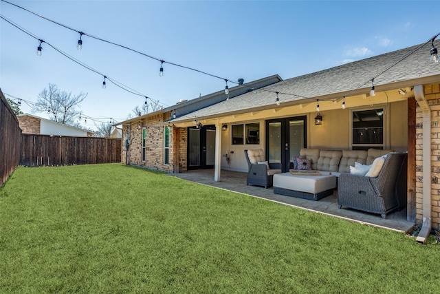 back of property featuring an outdoor living space, a patio, a lawn, and a fenced backyard