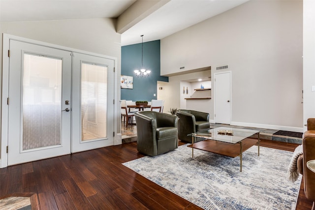 living area with visible vents, high vaulted ceiling, wood finished floors, french doors, and a chandelier