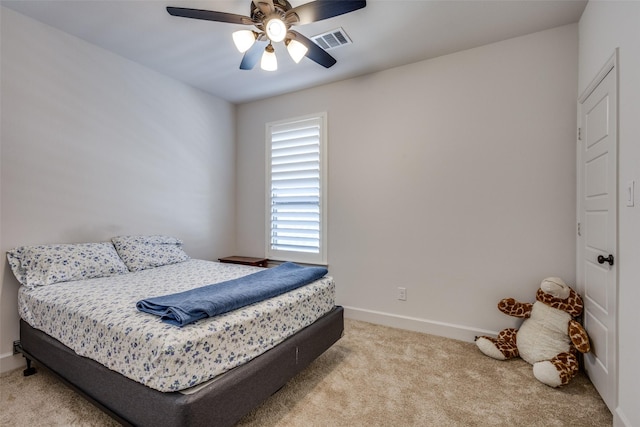 bedroom featuring visible vents, baseboards, ceiling fan, and carpet flooring