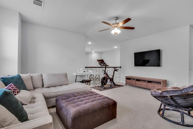 carpeted living area featuring visible vents, recessed lighting, and a ceiling fan