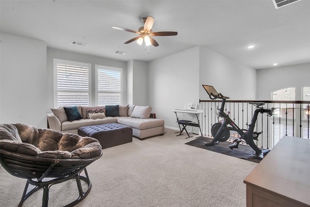 carpeted living room featuring visible vents, recessed lighting, and a ceiling fan