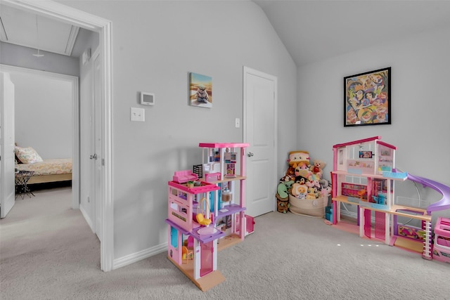 game room with attic access, carpet flooring, baseboards, and lofted ceiling