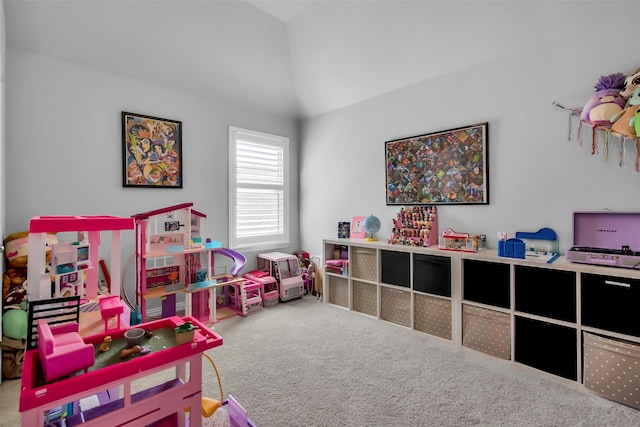 recreation room with lofted ceiling and carpet flooring