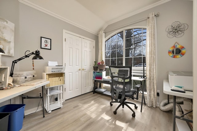 office area with crown molding, vaulted ceiling, and wood finished floors