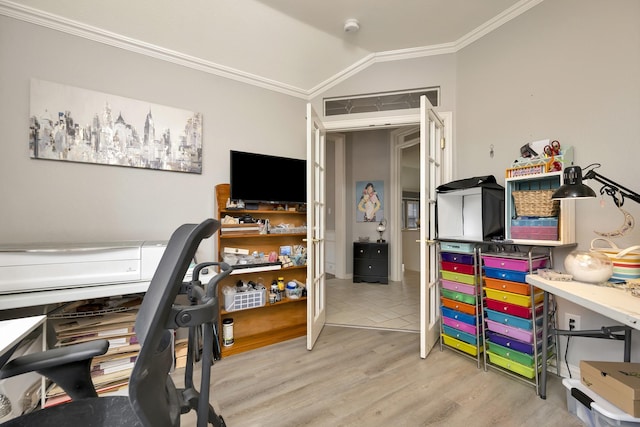 office featuring ornamental molding, wood finished floors, and lofted ceiling