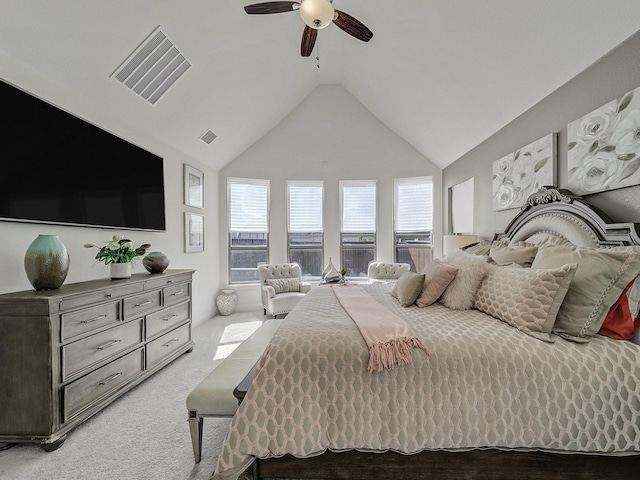 bedroom featuring high vaulted ceiling, visible vents, light colored carpet, and a ceiling fan