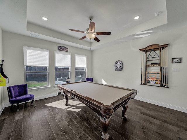 recreation room with visible vents, a ceiling fan, billiards, a tray ceiling, and dark wood finished floors