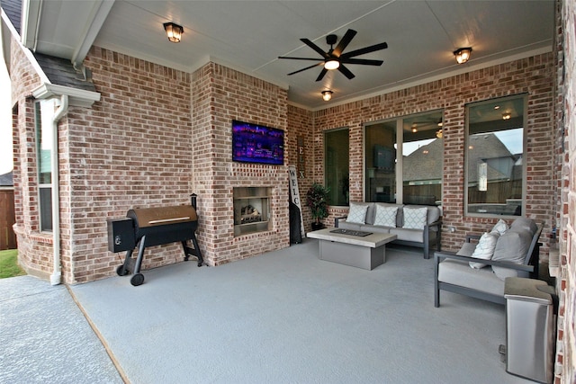 view of patio featuring an outdoor living space with a fireplace, a grill, and ceiling fan