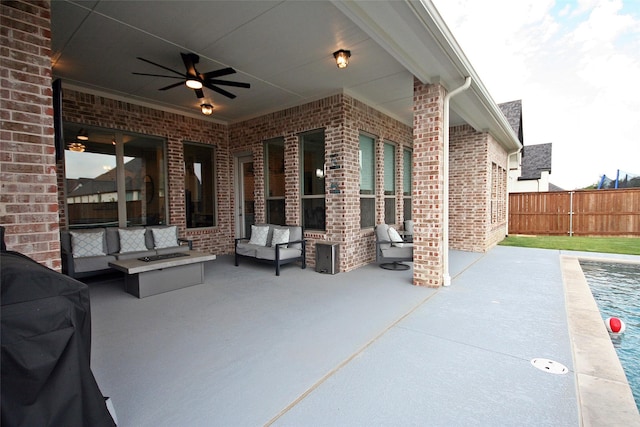 view of patio / terrace with an outdoor living space, grilling area, a ceiling fan, and fence