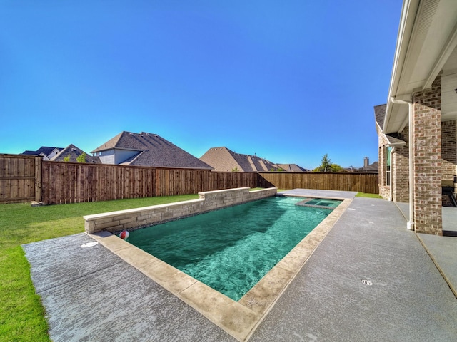 view of pool with a patio area, a yard, a fenced backyard, and a pool with connected hot tub