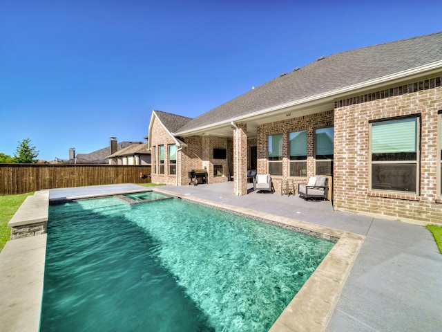 view of pool featuring a fenced in pool, a fenced backyard, and a patio area