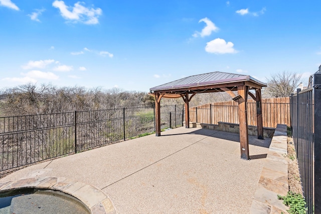 view of patio / terrace with a gazebo and a fenced backyard