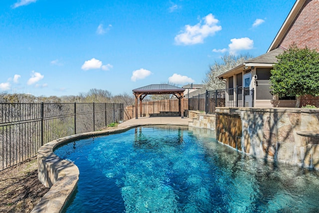 view of pool featuring a gazebo, a fenced in pool, and a fenced backyard