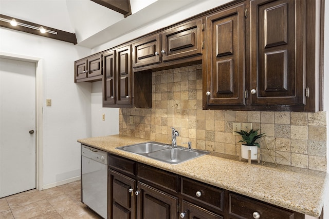 kitchen with a sink, white dishwasher, light countertops, decorative backsplash, and dark brown cabinets