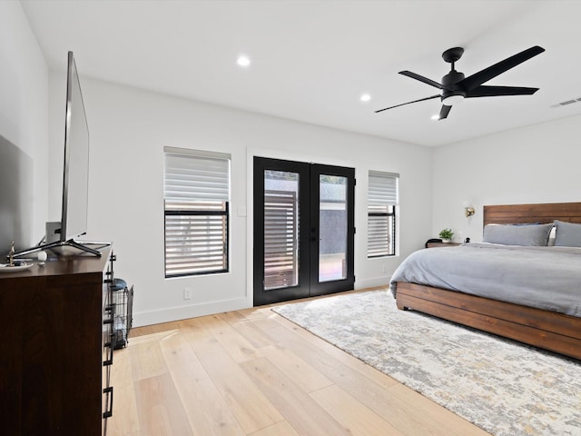 bedroom featuring visible vents, light wood-type flooring, recessed lighting, french doors, and access to outside