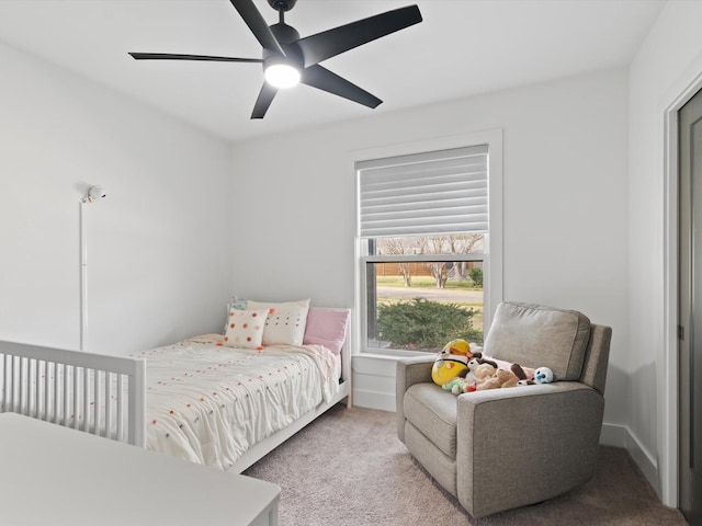 bedroom with carpet, baseboards, and ceiling fan