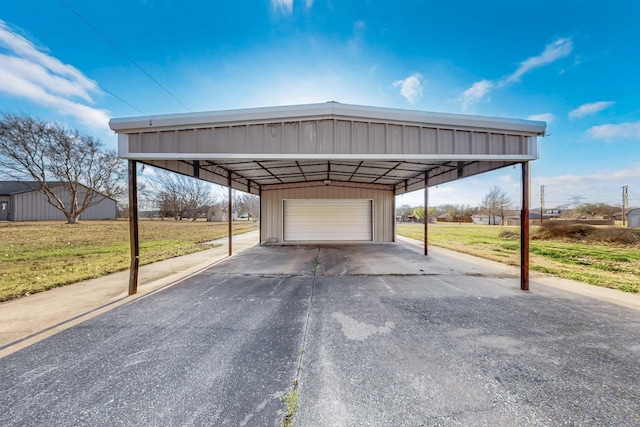 view of car parking featuring a garage