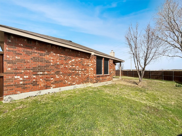 exterior space featuring fence